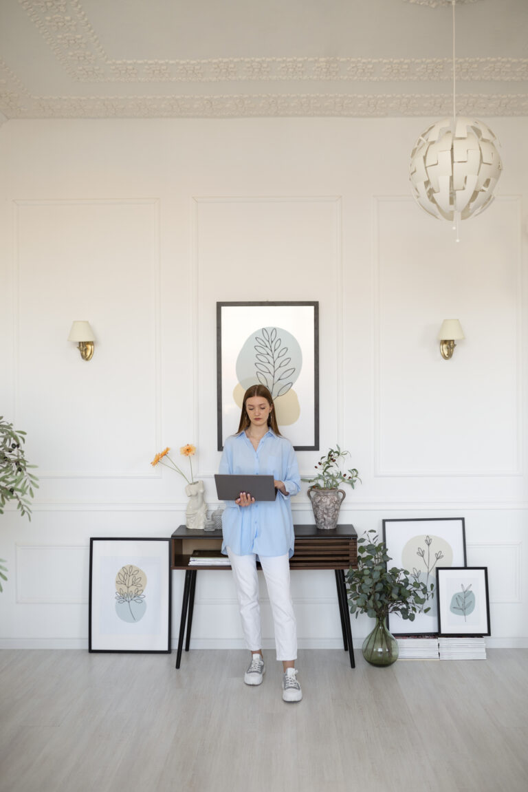 woman-using-laptop-minimal-decorated-room